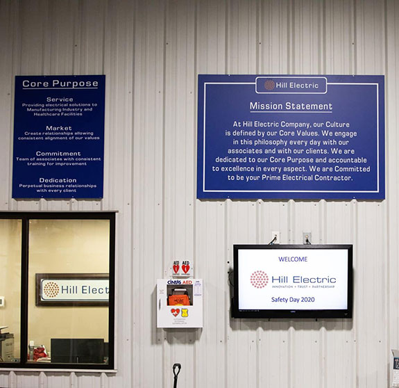 Hill Electric headquarters' mission statement, core purpose and values, are displayed proudly in our workplace.